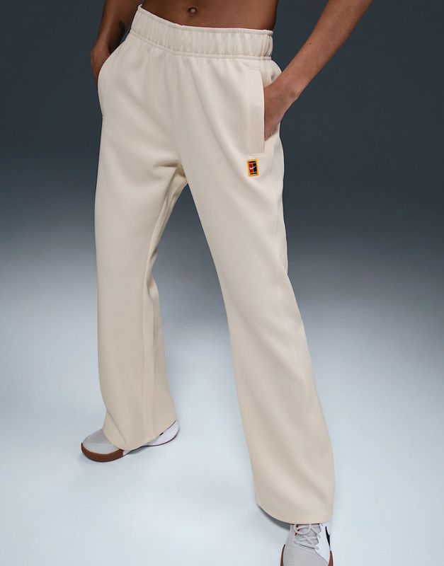 NikeCourt Heritage Windrunner Women's Tennis Pants (Pale Ivory)